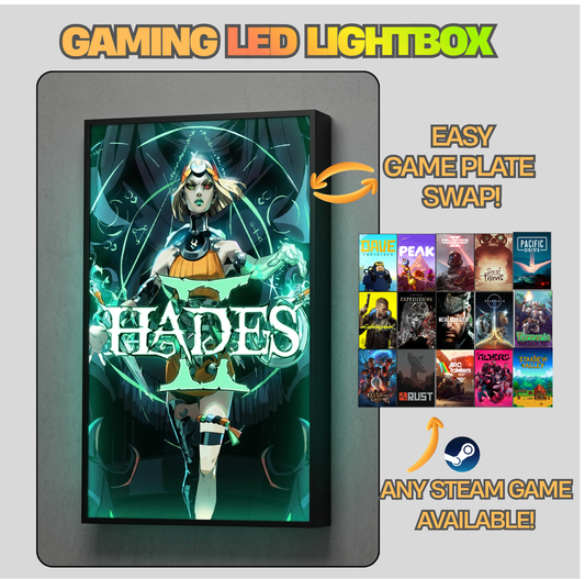 Gaming LED lightbox displaying 'Hades' with swapable game plates and Steam compatibility.
