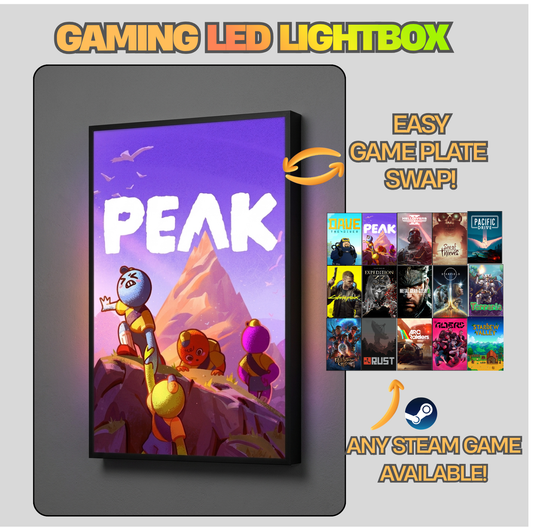 Gaming LED lightbox with 'Peak' game display and swapable game plates on a gray background.