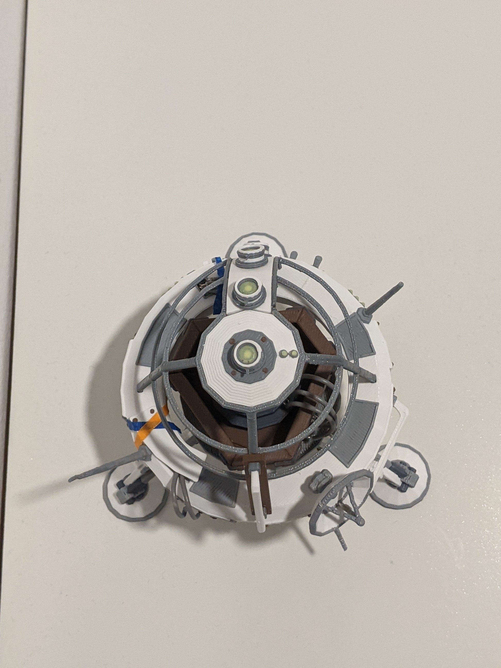 Outer wilds scout launcher miniature on top