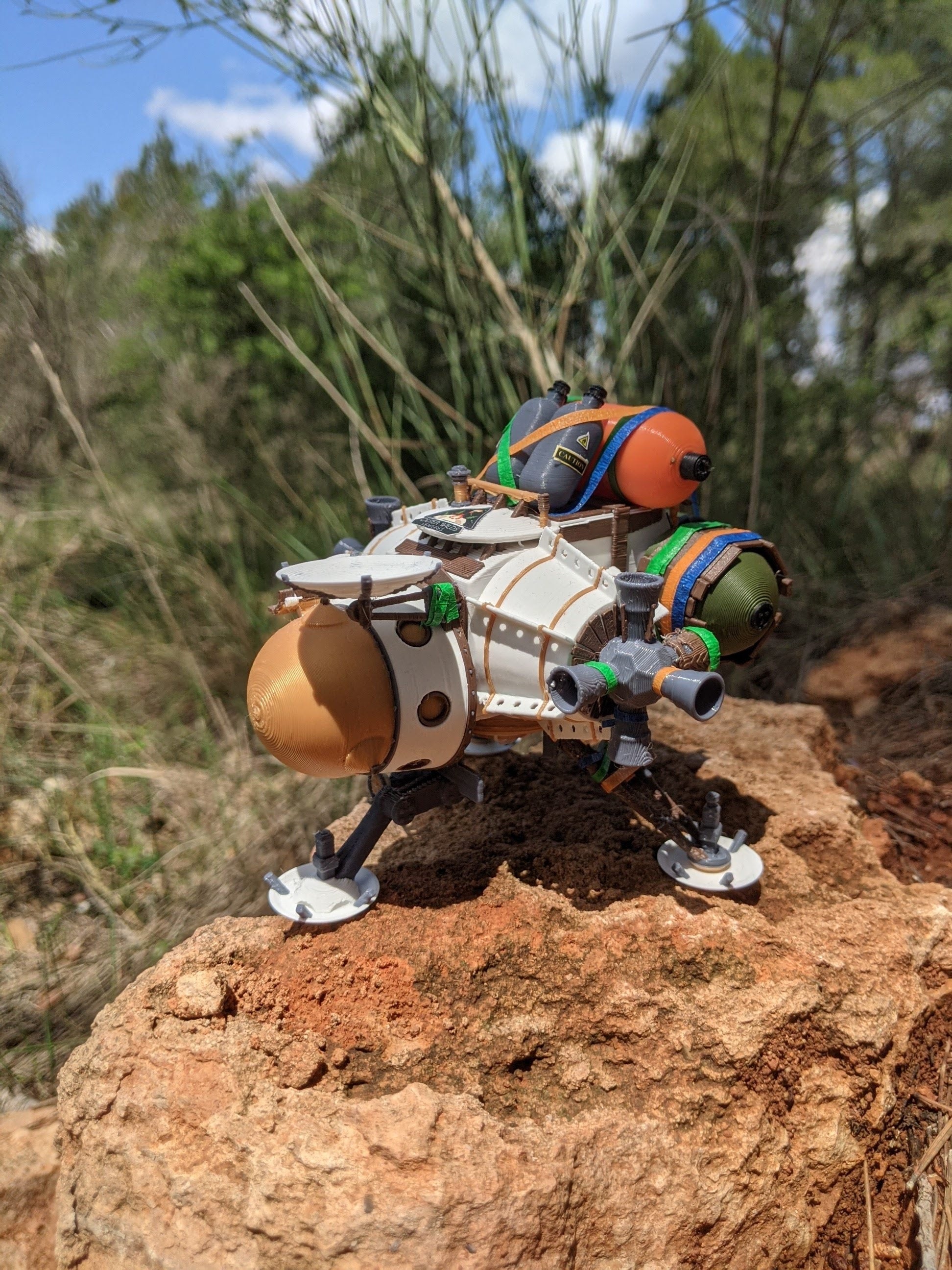 Outer wilds ship on a rock